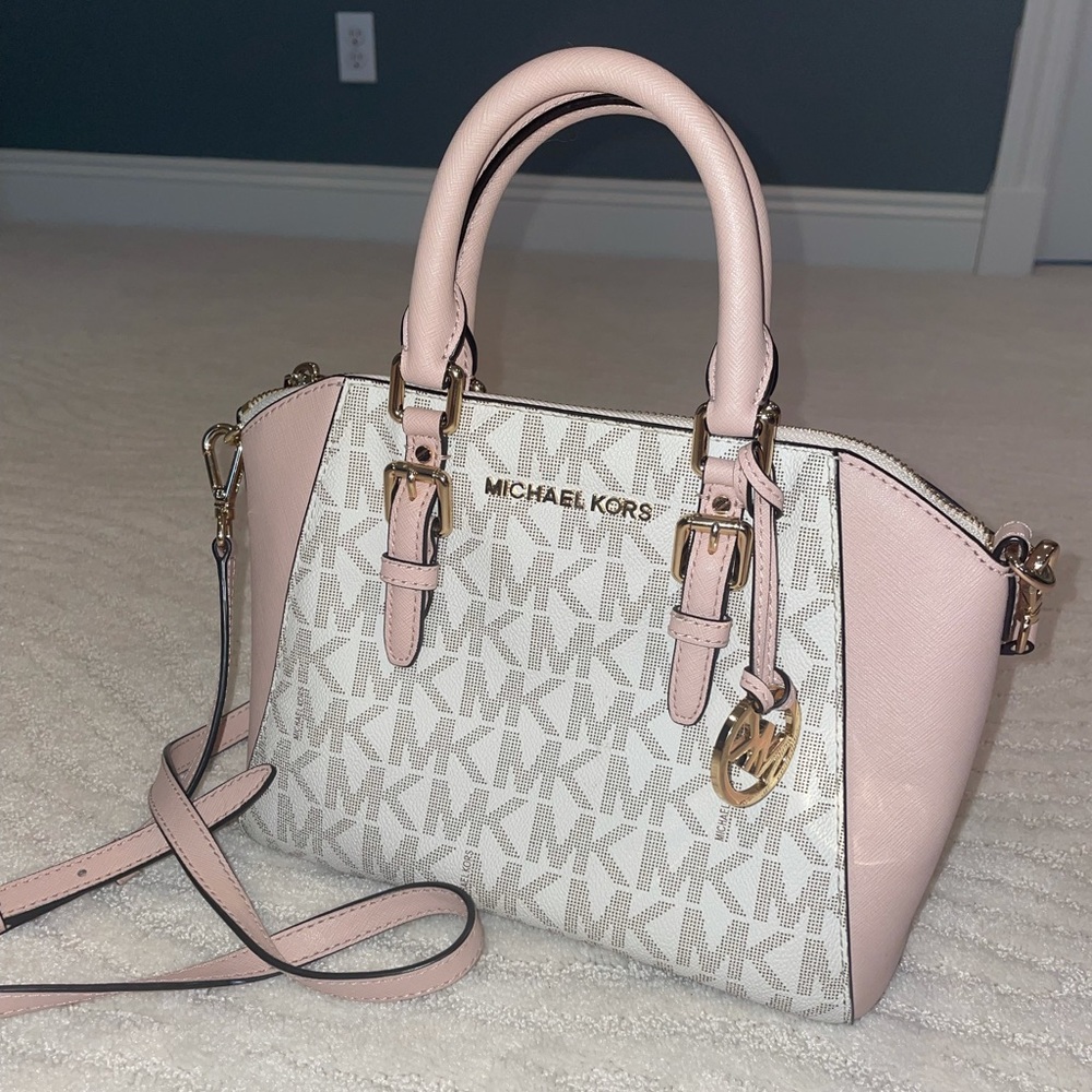 Michael Kors, medium sized, cross-body purse that was gently used.